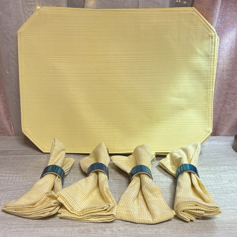 Yellow Placemats with Napkins Set with Blue Napkin Rings